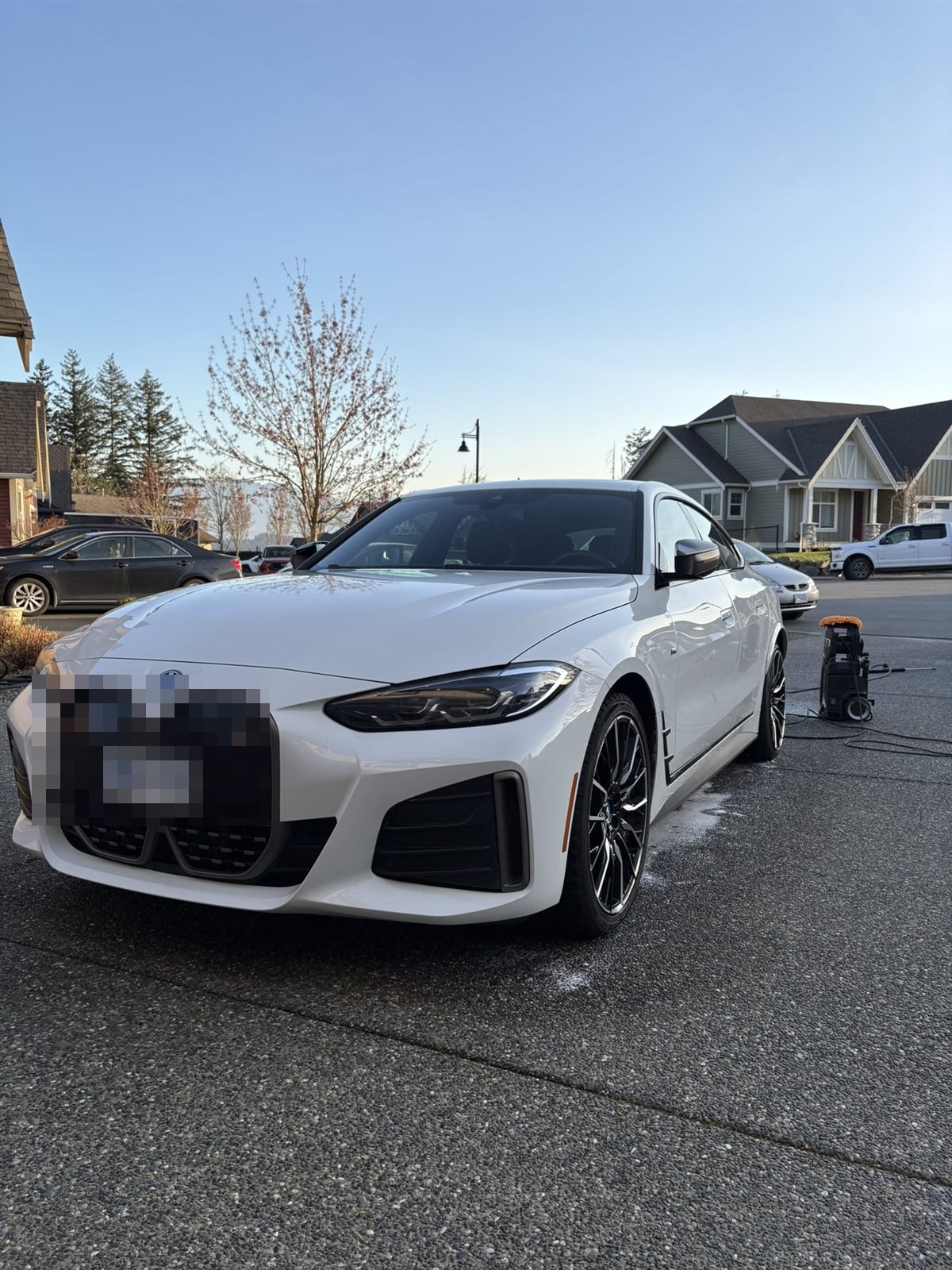 Mobile detailing equipment set up in a customer's driveway
